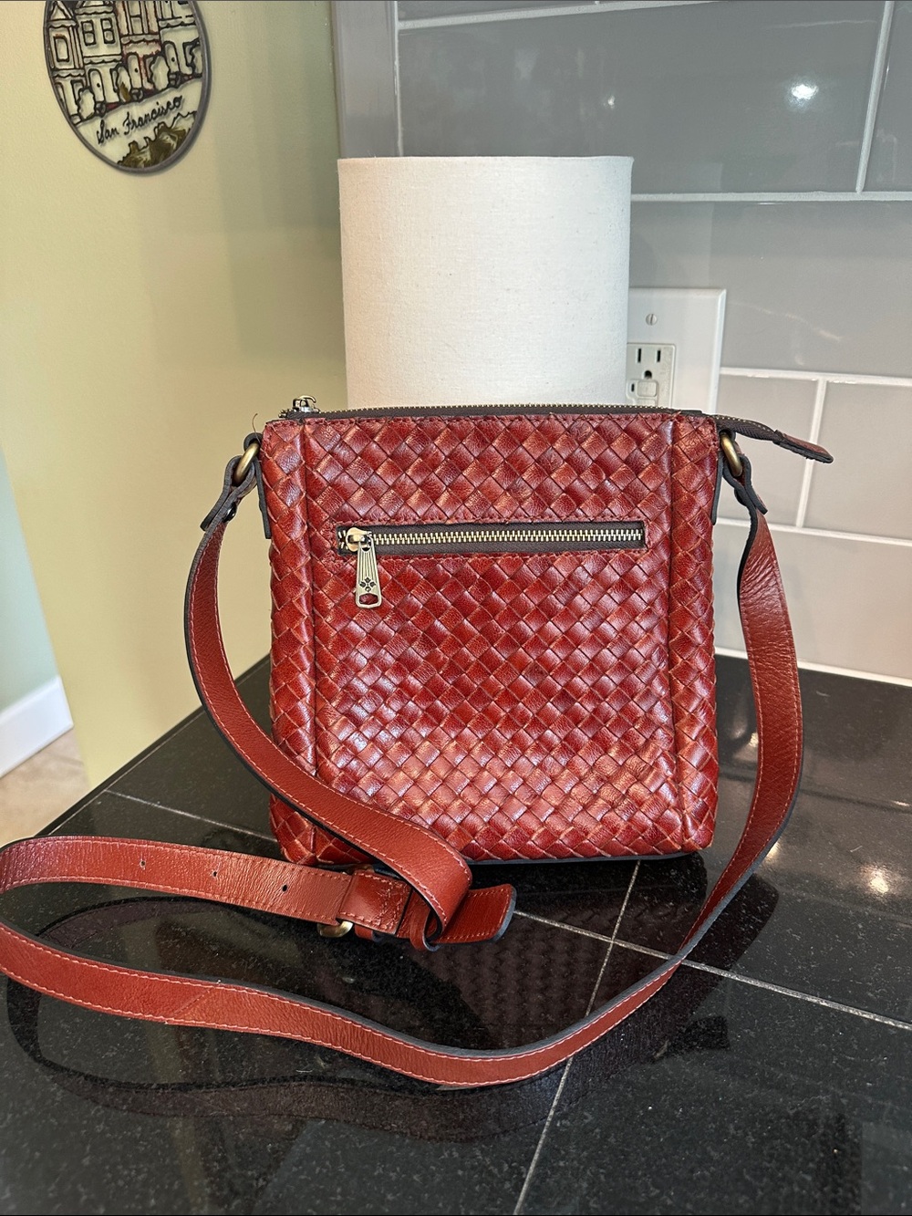 Patricia Nash Woven Leather Crossbody Bag in Deep reddish brown.